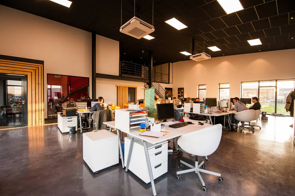 Open plan office with desks and computers planned by The Commercial Interior Company Ltd