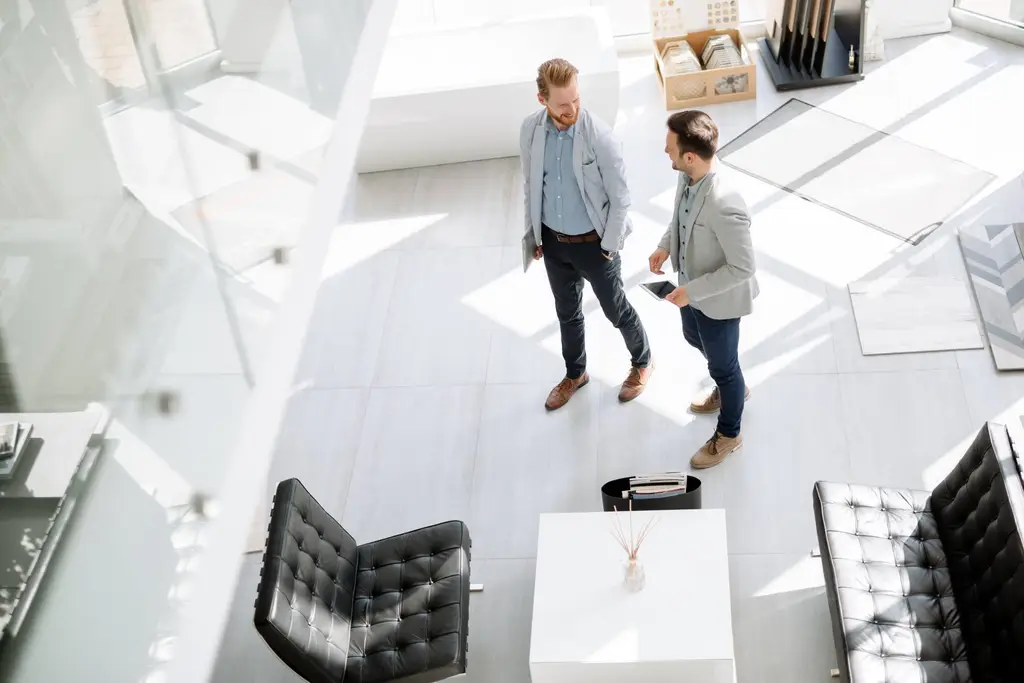 Business team working in an open office divided by partitions, Kingston upon Thames fit out